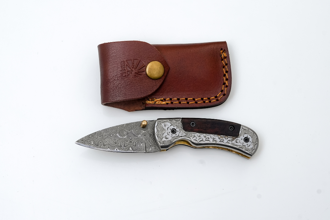 Hand-Forged Damascus Folding Knife | Engraved Bolster, Dark Wood Handle &amp; Intricate Spine File Work TF-074